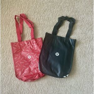 Lot of (2) reusable lululemon bags totes black red